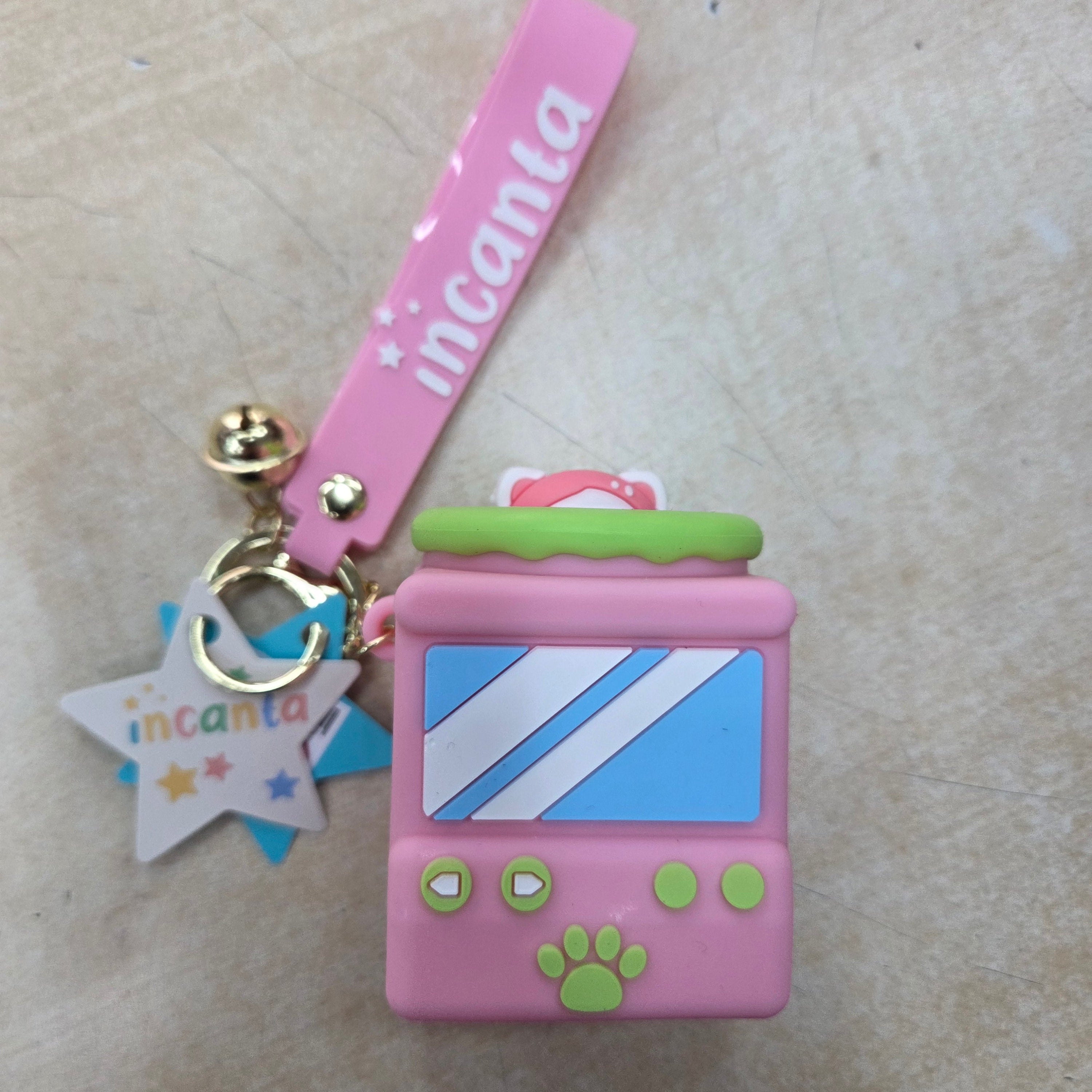 Incanta: Portachiavi in silicone sonnellino nascondino rosa azzurro verde