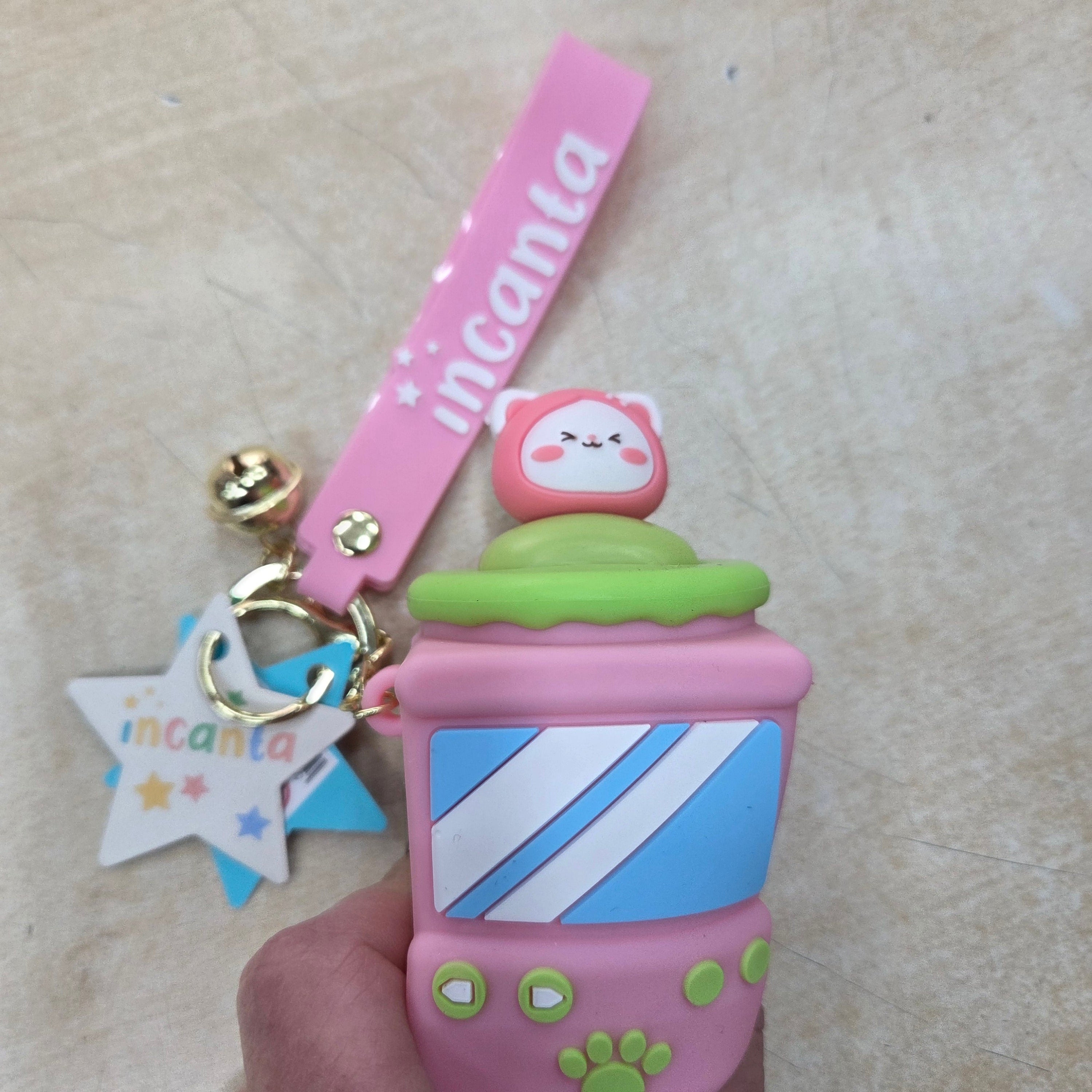 Incanta: Portachiavi in silicone sonnellino nascondino rosa azzurro verde