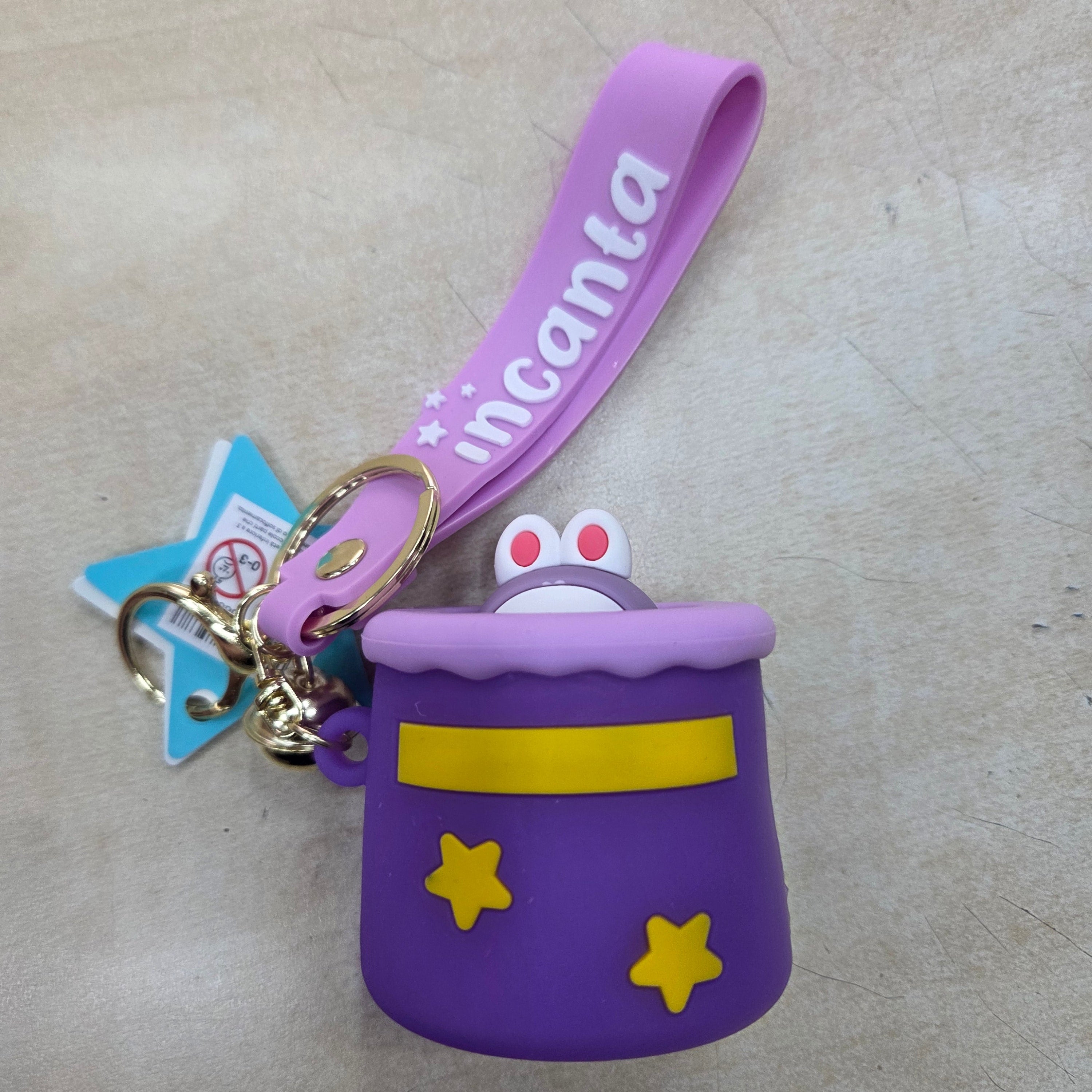 Incanta: Portachiavi in silicone sonnellino nascondino viola lilla giallo