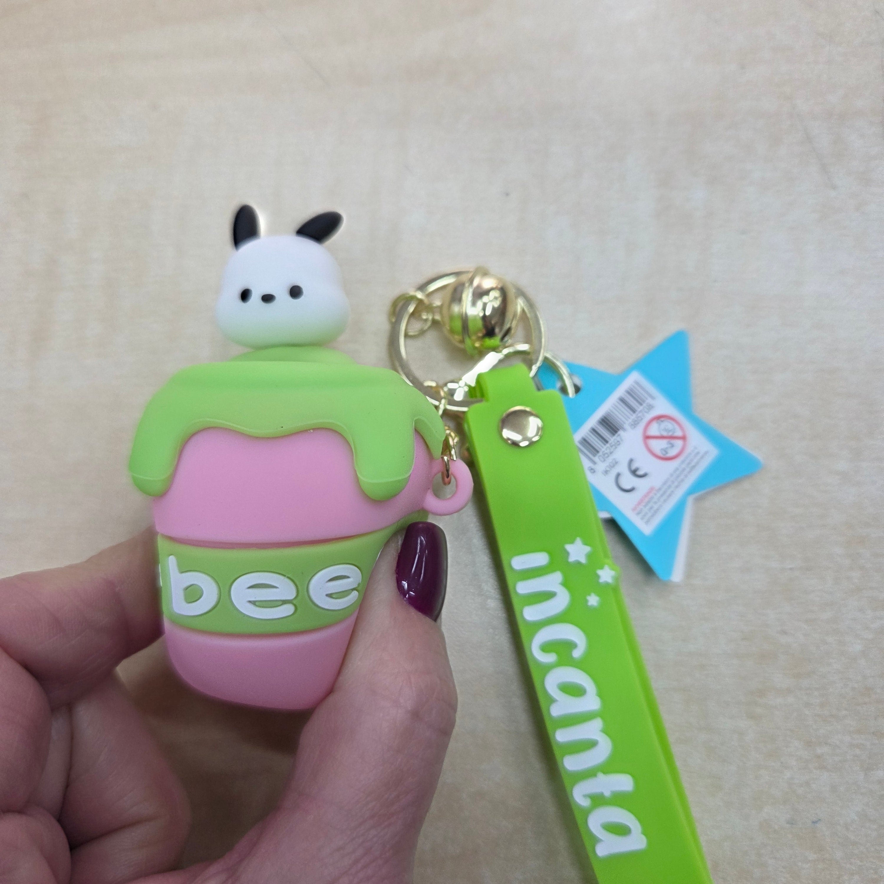 Incanta: Portachiavi in silicone sonnellino nascondino rosa e verde