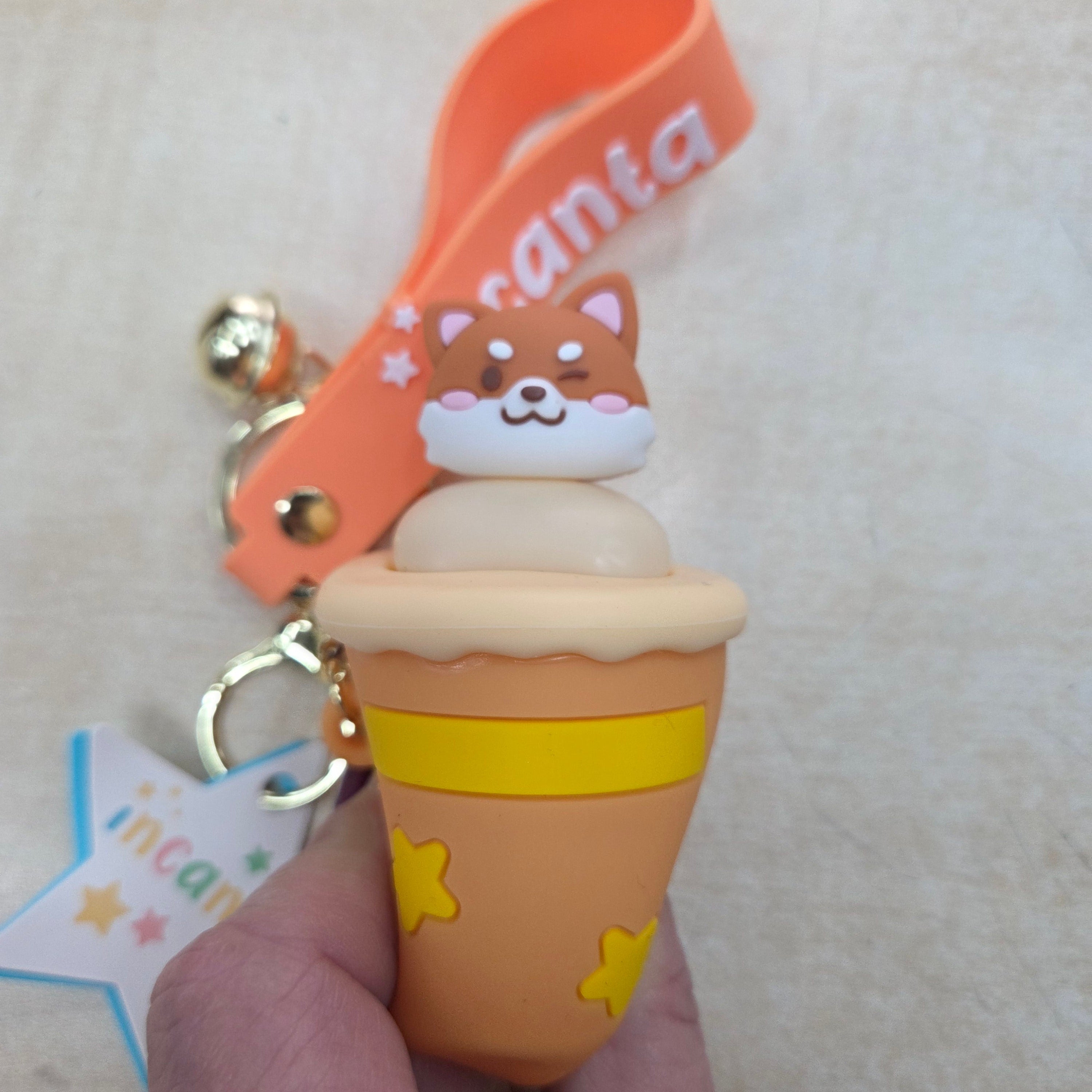 Incanta: Portachiavi in silicone sonnellino nascondino ocra giallo beige