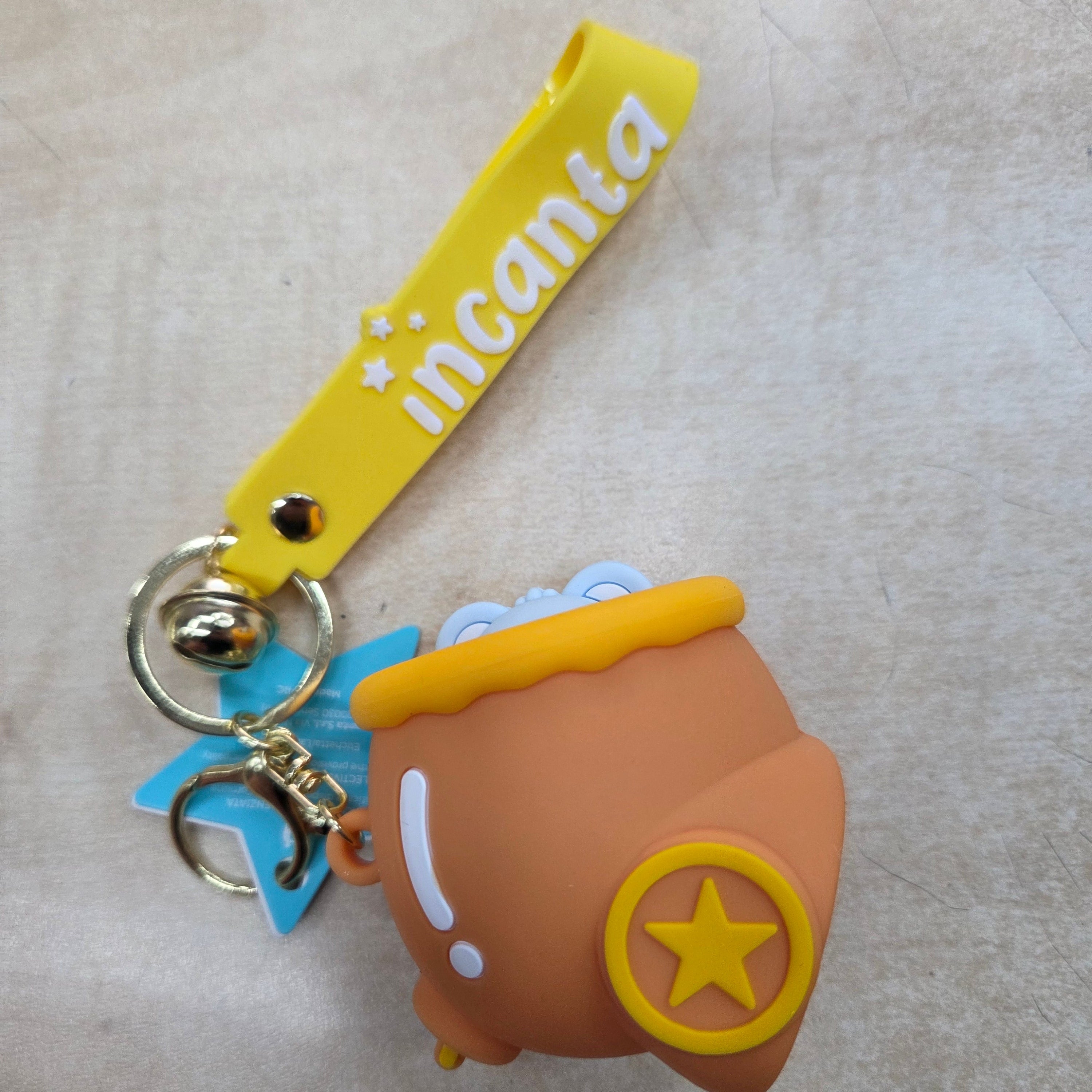 Incanta: Portachiavi in silicone sonnellino nascondino ocra arancio