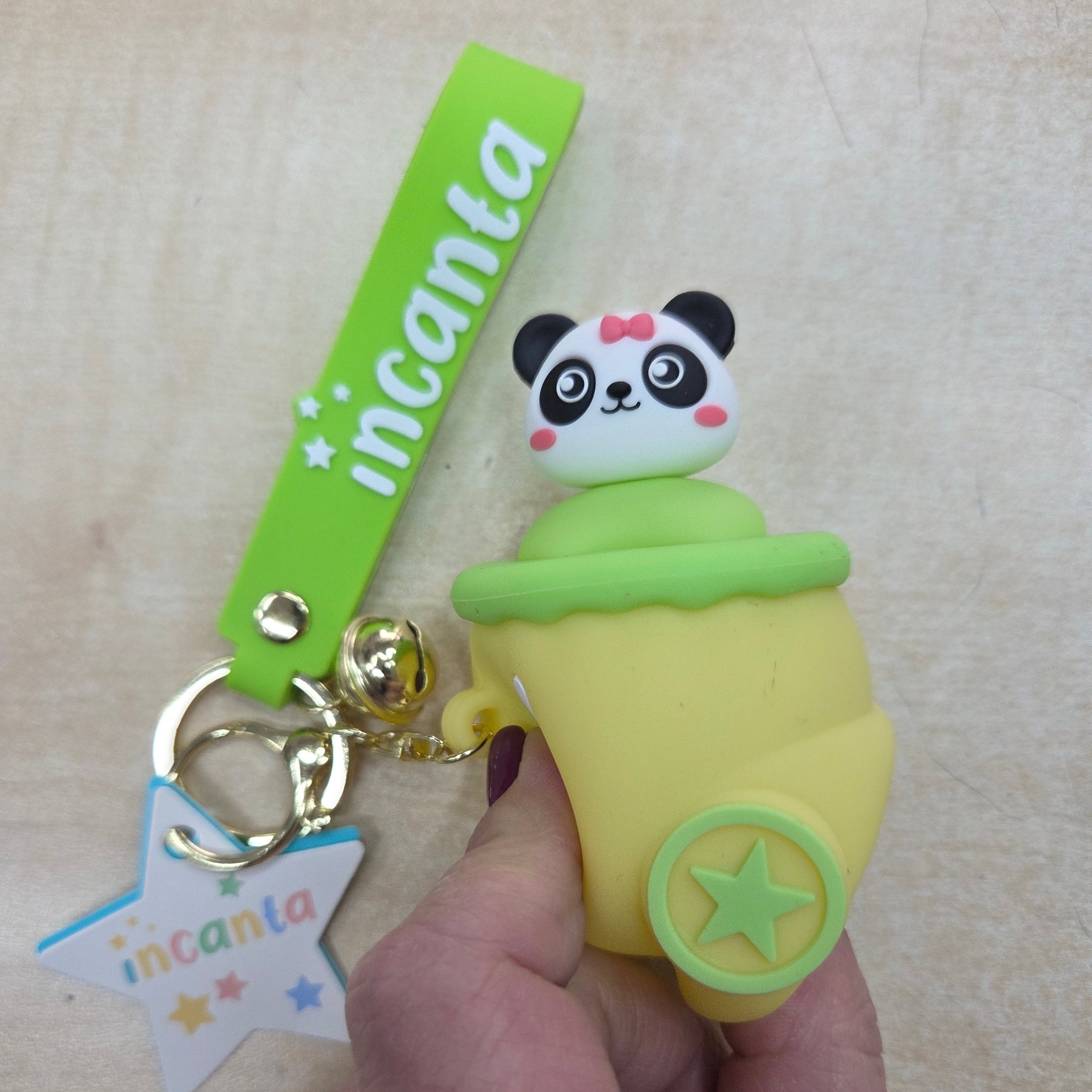 Incanta: Portachiavi in silicone sonnellino nascondino giallo verde