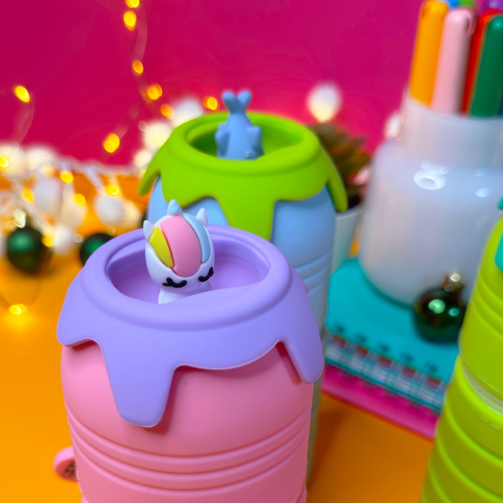 Tinta Unita: Astucci Squeezy Me  in silicone a molla